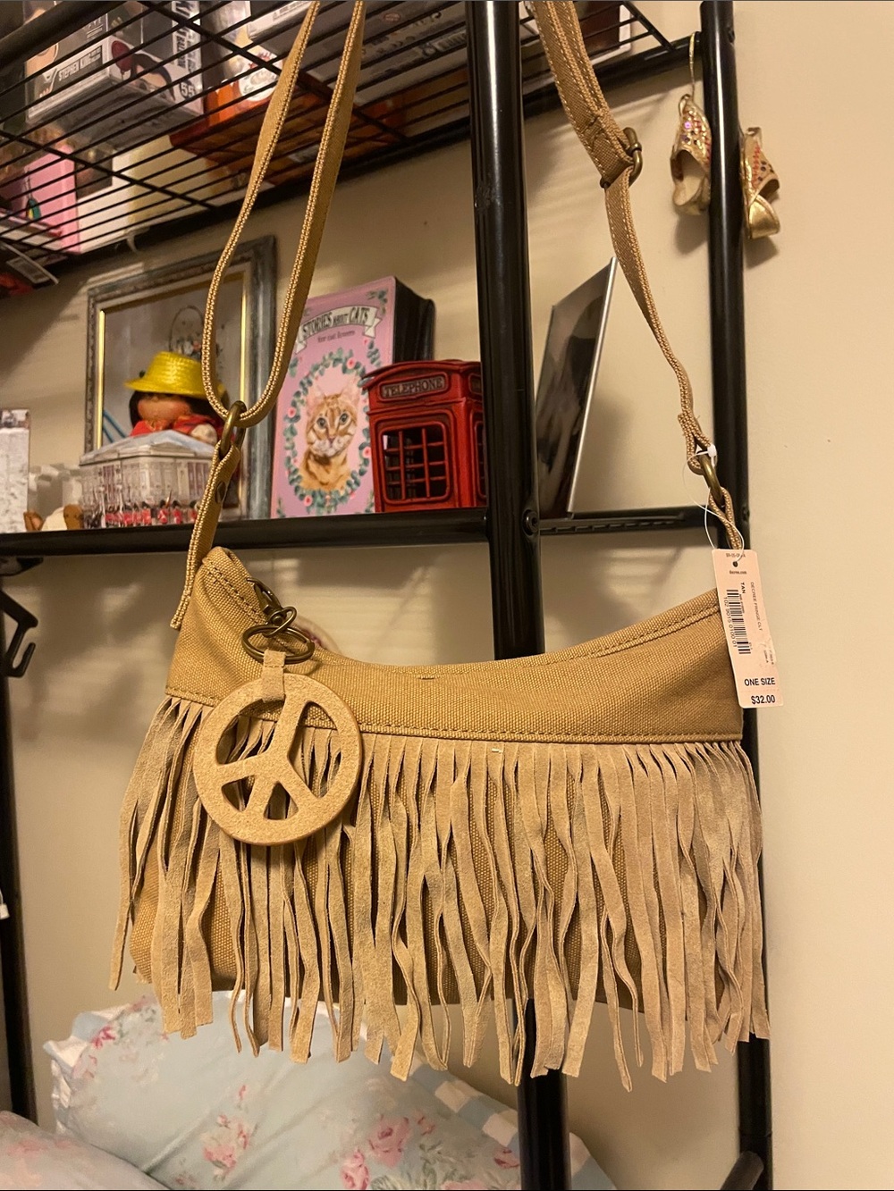 Decree Fringe Canvas Crossbody Bag with Peace Sign Accent